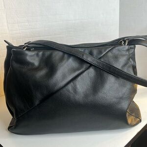 Gianni Conti large soft black leather shoulder purse.